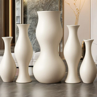 Grand vase à fleurs cylindrique pour escaliers de mariage moderne décoration de sol en métal et verre pour la maison Vases à fleurs en forme d'amphore en cristal bon marché