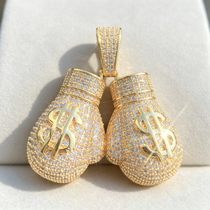 Collier pendentif gant de boxe doré avec symbole du dollar, zircone cubique pavée, plaqué or 14 carats, style hip-hop pour homme - Product Image 1