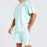 Conjuntos de camiseta y pantalones cortos de dos piezas para hombre, informales, de verano, transpirables, de algodón, con cuello redondo, de color sólido, para hombre y mujer.