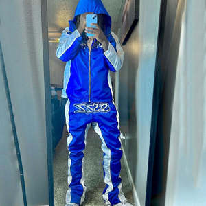 Conjunto de Chaqueta y Pantalones Deportivos de Invierno de Nailon Personalizado, Chaqueta Cortavientos Informal de Gran Resistencia, Chándal Cortavientos para Hombre - Product Image 6