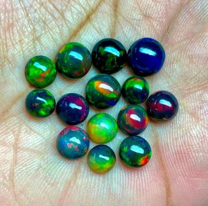 FF JEWELLERS Opale d'Éthiopie noire naturelle, taille brillant, cabochon, pierres précieuses en vrac, 8-10mm, effet de couleur, certifiées par un tiers - Product Image 3