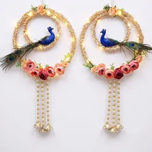 Décoration de porte artisanale en forme de paon avec des anneaux floraux, des roses roses, des perles et des clochettes suspendues pour une décoration festive traditionnelle de la maison - Product Image 1