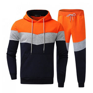 Men's premium performance tracksuits. Sleek athletic sets featuring full-zip jackets with matching tapered <b>joggers</b>. - Product Image 1
