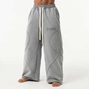 Pantalon en molleton décontracté pour homme, coupe ample, avec empiècements écologiques, en mélange de coton doux, idéal pour le quotidien et le style urbain. - Product Image 1