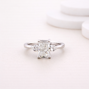 Lab Grown Radiant Cut Diamond Three-Stone <b>Ring</b> with Pear Side Stones in 9K White / Rose / Yellow <b>Gold</b> | Custom Fine Jewelry - Product Image 1