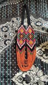 Handmade tribal seed beaded <b>necklace</b> with vibrant ethnic patterns, multilayer design and bold <b>statement</b> appeal - Product Image 2