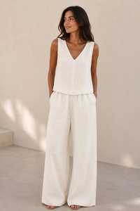 Conjunto de Top Corto sin Mangas con Cuello Redondo en Spandex/Algodón Blanco para Mujer con Pantalones Anchos de Lona, Estilo Minimalista, Tejido Transpirable - Product Image 1