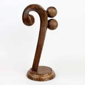 Ornement musical TW en bois foncé sculpté, avec un motif de cœur et de note entrelacés, pour la décoration esthétique d'un studio à domicile. - Product Image 4