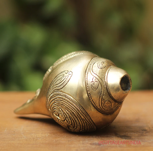 Ornate vintage brass shankh with detailed traditional relief carvings, perfect for decor, available at wholesale prices. - Product Image 3