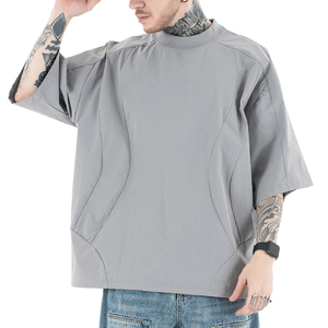เสื้อยืดคอกลมแขนสั้นสีพื้นทรงโอเวอร์ไซส์สำหรับผู้ชาย เนื้อผ้าถักระบายอากาศ สไตล์สตรีทลำลอง - Product Image 1