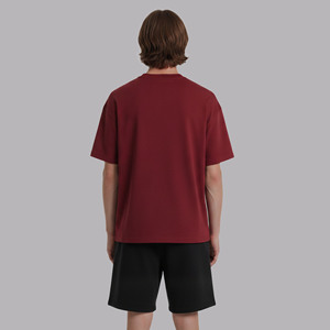 Conjunto de camiseta y pantalón corto de color sólido personalizado OEM/ODM para hombre, conjunto de 2 piezas con hombros caídos, peso medio, 100% algodón. - Product Image 2