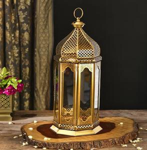 Ornate gold <b>Moroccan</b> style <b>lantern</b> with mesh dome and clear glass panels for home decor, available at wholesale prices. - Product Image 1