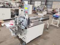 Machine d'emballage semi-automatique pour papier mouchoir XINYUN avec moteur à engrenages, 7-10 sacs/min, garantie 1 an, prix usine bas, CE