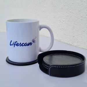 Posavasos redondos de cuero genuino con soporte Posavasos de cuero para bebidas Juego de 4 posavasos con soporte para mesa de centro. - Product Image 2