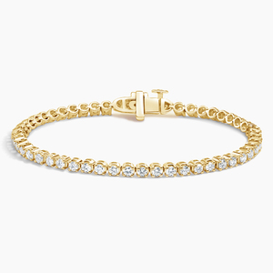 Pulsera de tenis con diamantes de corte redondo y engaste de punta compartida de eternidad completa - Product Image 1