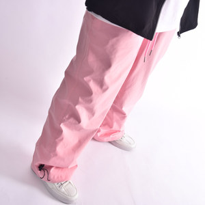 Pantalon de ski imperméable rose léger en polyester 100% avec ceinture à cordon poches zippées sécurisées et bouches d'aération - Product Image 1
