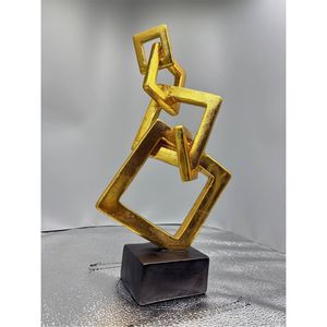 Sculpture contemporaine d'anneaux géométriques dorés entrelacés sur base lourde, pièce de décoration de luxe pour l'aménagement intérieur, décoration de bureau, hall d'hôtel - Product Image 1
