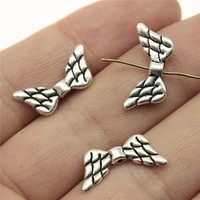 Perle intercalaire en forme d'aile plumeuse 19x9mm en alliage de zinc argent antique pour bracelet commémoratif ange gardien