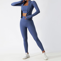 Blauwe 2-delige yogaset Hoge taille legging Crop top Volledige mouw Rits aan de voorkant Naadloze activewear Dames sportkleding