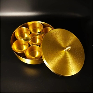 Wholesale Handcrafted Brass <b>Spice</b> Box Round Masala Dabba <b>Set</b> with 7 Compartments & Spoon Embossed Lid Kitchen Storage Container - Product Image 1