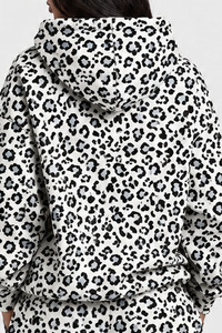 Conjunto de chándal informal de dos piezas para mujer: Sudadera con capucha y pantalones anchos con estampado de leopardo blanco y negro, a juego y a la moda. - Product Image 5