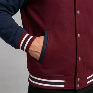 Chaqueta Varsity Unisex Storm Fit Color Granate y Azul Marino, Estilo Urbano, Logotipo Bordado, Cuello Alto, Corte Regular, Ropa de Invierno - Product Image 3