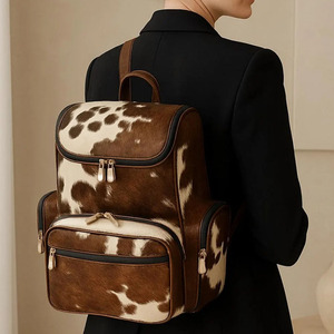 Wholesale cowhide leather hair student <b>backpacks</b> OEM supplier custom logo premium export quality school bags in affordable price - Product Image 1