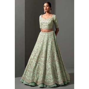 Lehenga choli ชุดปาร์ตี้ออกแบบด้วยด้ายและ dori ทำงานเครื่องประดับชาติพันธุ์อื่นๆ - Product Image 3