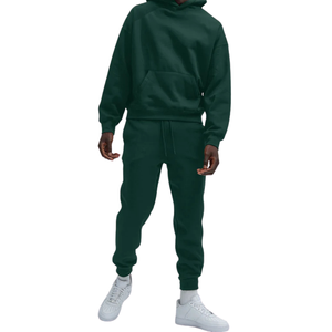 Pantalon de jogging personnalisé pour homme en molleton uni, coupe décontractée fuselée, taille à cordon de serrage, bas de pantalon à revers, Fournisseur en gros d'articles vestimentaires OEM - Product Image 1