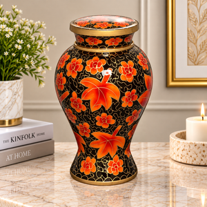 Urne funéraire artisanale en métal noir avec motifs floraux en feuille d'érable orange et accents dorés antiques, porte-cendres commémoratif - Product Image 1