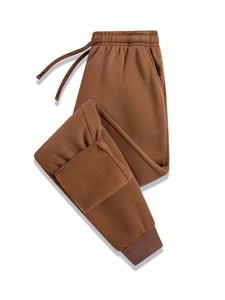 Conjunto deportivo acampanado y holgado con forro polar suave, cintura elástica y pantalones de pierna ancha para un estilo relajado pero cómodo. - Product Image 5