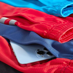 Shorts de sport décontractés pour hommes, séchage rapide, respirants, couleur unie, taille élastique, mi-longs, en polyester tissé avec bande latérale - Product Image 6