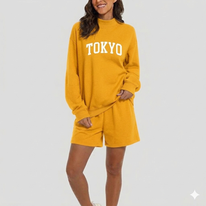 Ensemble haut à col montant et short pour femme, mettant en valeur une esthétique raffinée grâce à une composition moderne en deux pièces - Product Image 1