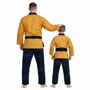 Ensemble d'uniformes d'arts martiaux personnalisés en or et bleu marine pour hommes et garçons, combinaison d'entraînement en coton de qualité supérieure pour le karaté et le BJJ, vente en gros - Product Image 2