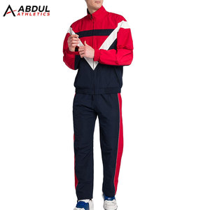 Traje deportivo cortavientos para hombre, conjunto ligero de alto rendimiento con chaqueta y pantalones a juego para deportes y entrenamiento. - Product Image 1
