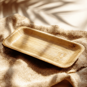 Assiettes rectangulaires écologiques en feuilles de palmier biodégradables pour sushis et service, idéales pour mariages, fêtes et plats à emporter - Product Image 1