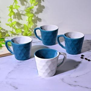 Blue & White Dual-Tone Ceramic <b>Tea</b> <b>Cup</b> <b>Set</b> of 2 Textured Dual-Tone <b>Tea</b> <b>Cups</b> - Product Image 1