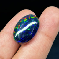 Opale noire d'Éthiopie naturelle – Cabochon ovale en forme de nid d'abeille (18,75 carats)