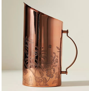 Elegant <b>copper</b> jug featuring intricate floral engravings and a sleek, modern <b>handle</b> design, available at wholesale price - Product Image 1