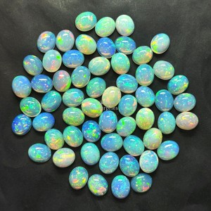 Cabujón ovalado de ópalo de fuego etíope natural de 10x12 mm con efecto de fuego AAA, piedras preciosas sueltas para la fabricación de joyas a precio mayorista. - Product Image 6