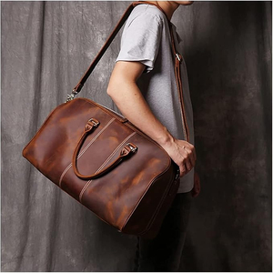 ราคาขายส่ง กระเป๋าเดินทางแบบกันน้ำสำหรับทุกเพศ  กระเป๋าหนัง PU แบบสั่งทำพิเศษ ความจุขนาดใหญ่ หลายช่องใส่ของ  กระเป๋าหนังแท้สำหรับเดินทางค้างคืน - Product Image 2