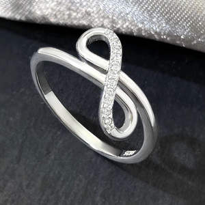 Anillo de compromiso y aniversario de boda de plata de ley 925 con circonita cúbica y diseño de infinito cruzado, deslumbrante y moderno para mujer, 0.10 - Product Image 4