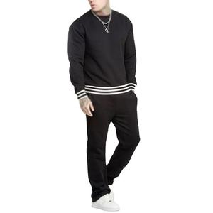 Ensemble de survêtement noir pour homme, col rond, manches longues, couleur unie, vêtement décontracté, coton respirant, style automne, coupe ample avec poche latérale - Product Image 1
