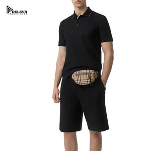 เสื้อเชิ้ตแขนสั้นผู้ชายสีดำ ยี่ห้อ RELEVO INDUSTRIES ผ้าถักเนื้อนุ่ม ระบายอากาศได้ดี ผลิตจากผ้าฝ้าย 100% สีพื้น สไตล์ลำลอง ปกคอเสื้อแบบพับได้ - Product Image 6