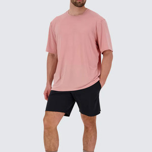 ผู้ผลิตเสื้อผ้า OEM ขายส่ง เสื้อยืดโอเวอร์ไซส์ทรงหลวมสำหรับทุกเพศ แบบเรียบ ไม่มีลาย พิมพ์โลโก้ตามสั่ง ผ้าฝ้าย 100% แห้งเร็ว - Product Image 3