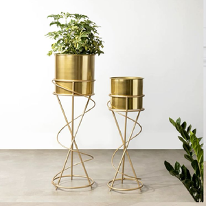 Elegant gold planters featuring a sophisticated spiral <b>wire</b> pedestal design, available at wholesale prices for premium decor. - Product Image 1