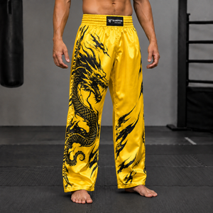 Pantalones de kickboxing de alto rendimiento hechos con tela transpirable de secado rápido para mayor movilidad. - Product Image 3