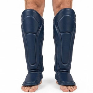 Protège-tibias en cuir de qualité supérieure pour les arts martiaux, le kickboxing, le Muay Thai, la pratique du MMA, construction légère et durable, confortable - Product Image 1
