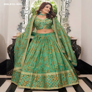 Organza de alta calidad con bordado de lentejuelas, estampado floral y borde dorado, conjunto de lehenga en forma de A color verde marino, proveedor de Surat. - Product Image 1