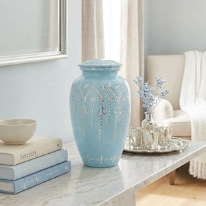 Urne commémorative en métal bleu ciel avec découpes florales complexes et accents argentés, récipient à cendres funéraires à couvercle - Product Image 4